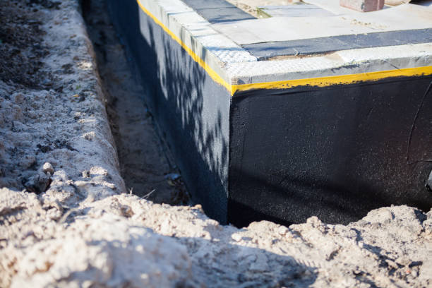 Professional Waterproofing technician working in Bartlett, IL